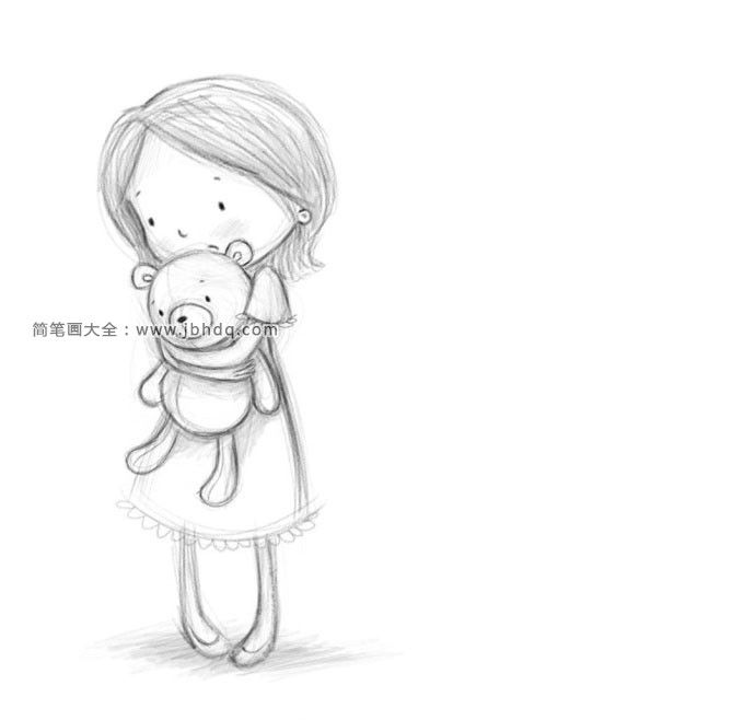 抱着玩具熊的小女孩