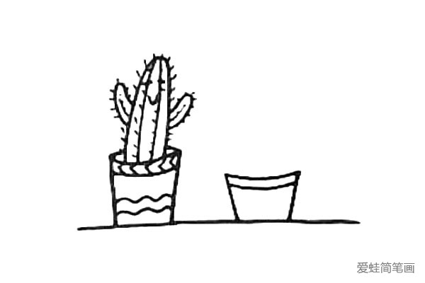 第六步:在右边画上它的小伙伴.先画上一个不同的花盆。