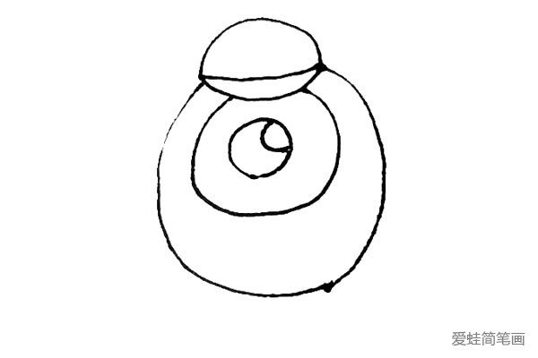 第三步：在大圆里面再画上一个圆，并在里面画上一个眼珠，注意画上高光。