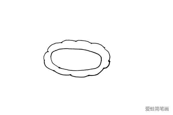 第二步：用波浪线绕着椭圆形画一圈。