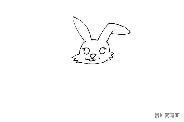 第三步：给小兔子画上可爱的五官，大大的眼睛，三角鼻头和两颗大门牙。