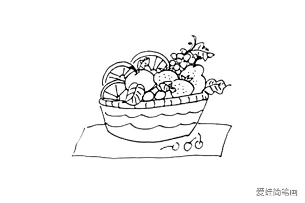 第六步：在水果篮下面画上长方形的桌布，在桌布上面画上几颗樱桃。