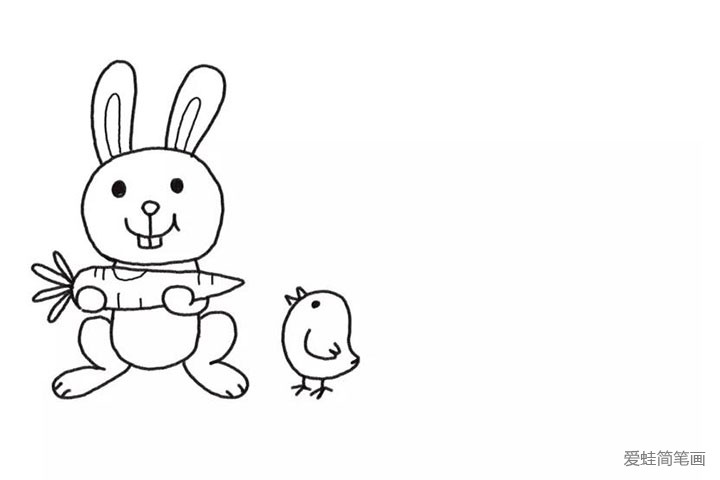 3.在小兔子右边画上一只小鸡。