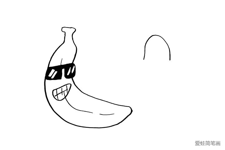 4.然后在旁边画出另一个香蕉.先画出香蕉头。