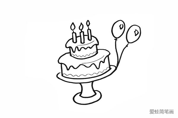 10.在把蛋糕装饰一下.旁边画两个气球。