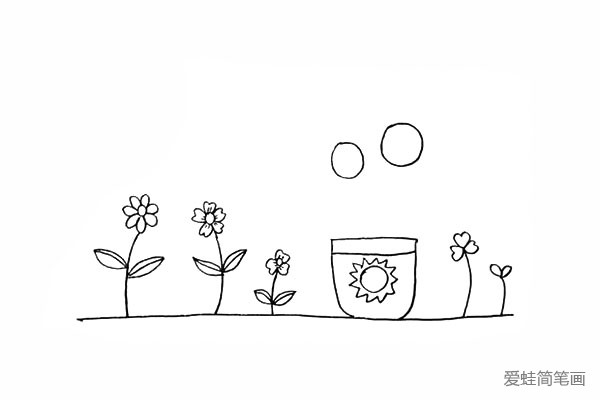 11.在花盆的上方画出两个大小不一的圆。